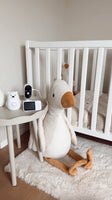 Numsy One babyfoon naast het ledikant, klantfoto