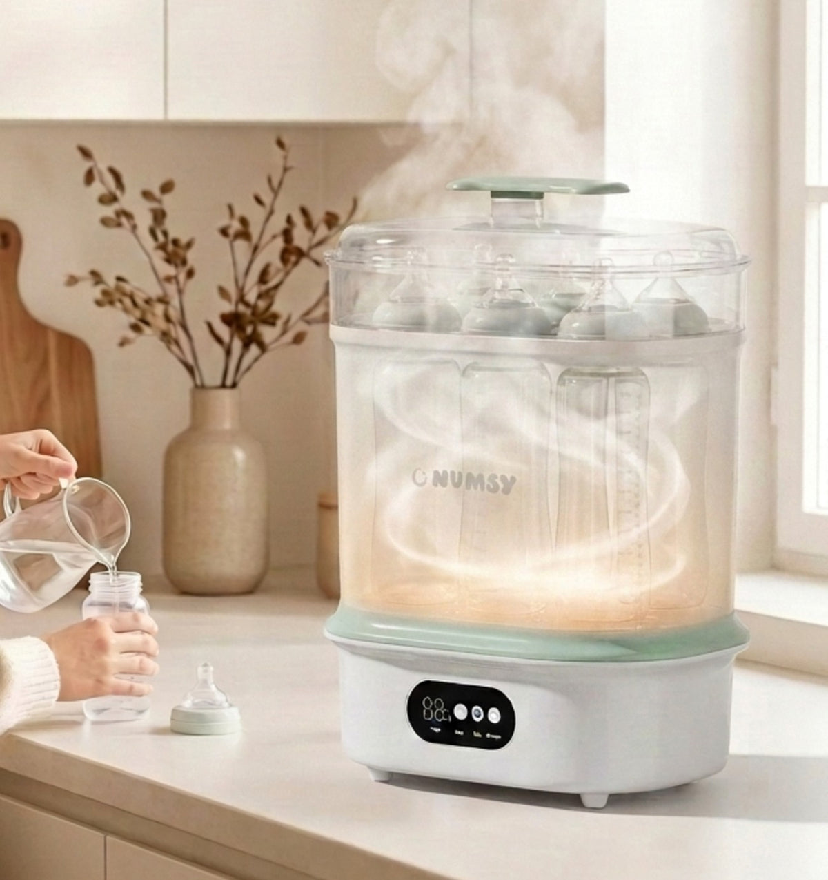 Numsy Steamix Plus met stoom op het aanrecht